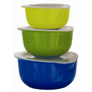 Plastic mixing bowls with lids are lightweight and cheap. 