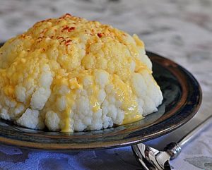 Cauliflower is ideal for cooking in the microwave and topping with cheese sauce.