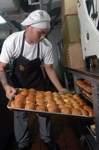 Restaurants and professional kitchens use full sheet pans which are usually too big for home ovens but fit just right in large commercial ovens. 