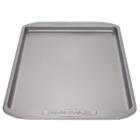 A cookie sheet is a half-sheet pan with a smaller lip. This is best for most home kitchens. 