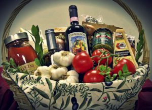 A gift basket with an Italian theme has all the ingredients to make a great meal.
