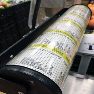 This code cylinder on top of the machine or register contains most, but not all, of the produce codes needed to checkout the item. 